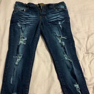 Dark wash distressed denim jeans